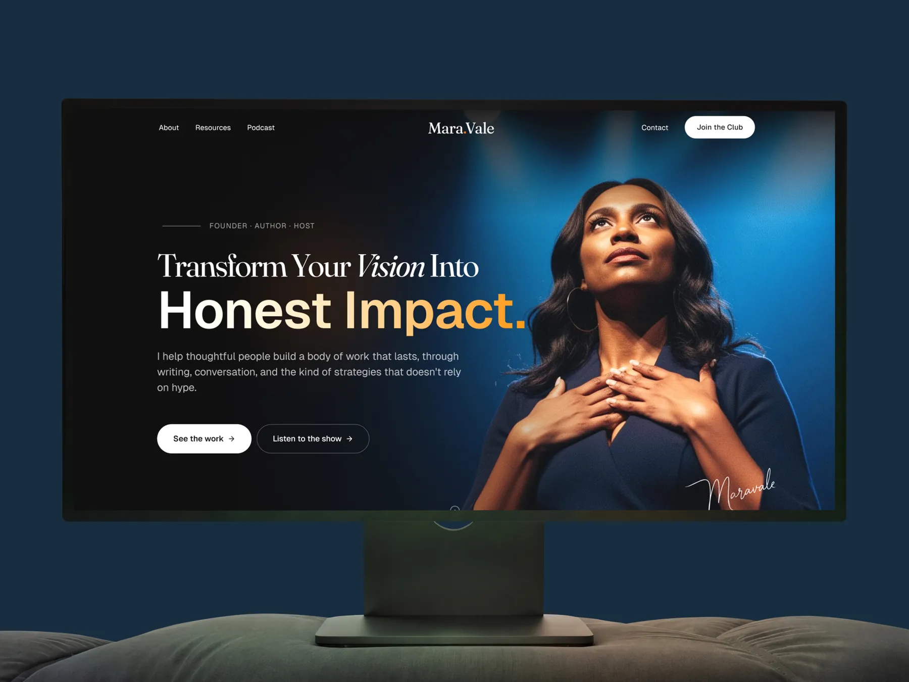 Personal brand website for an author and host shown on a large monitor