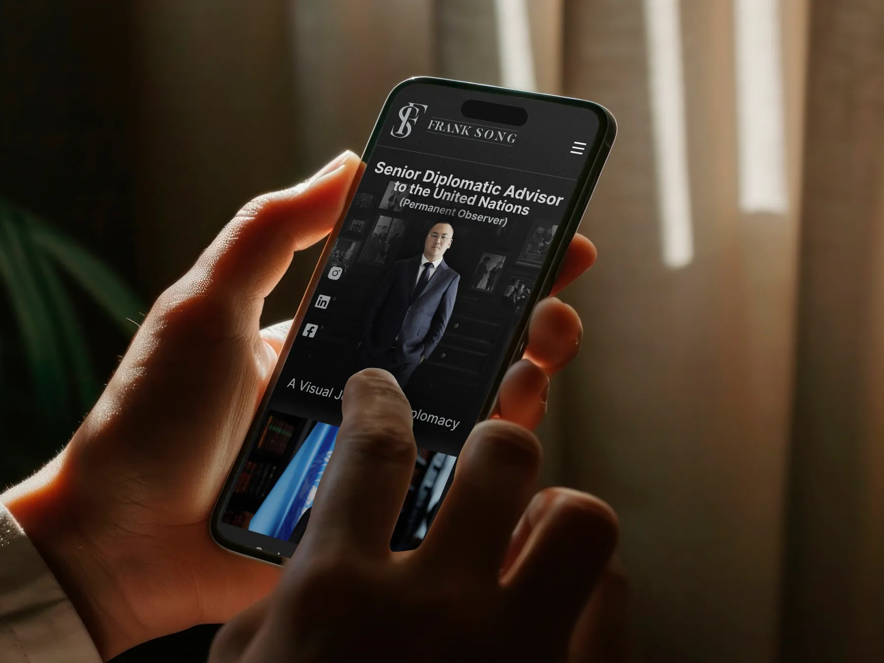 Mobile website for a diplomatic advisor shown on a phone